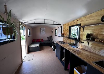 shepherds hut kitchen and living room