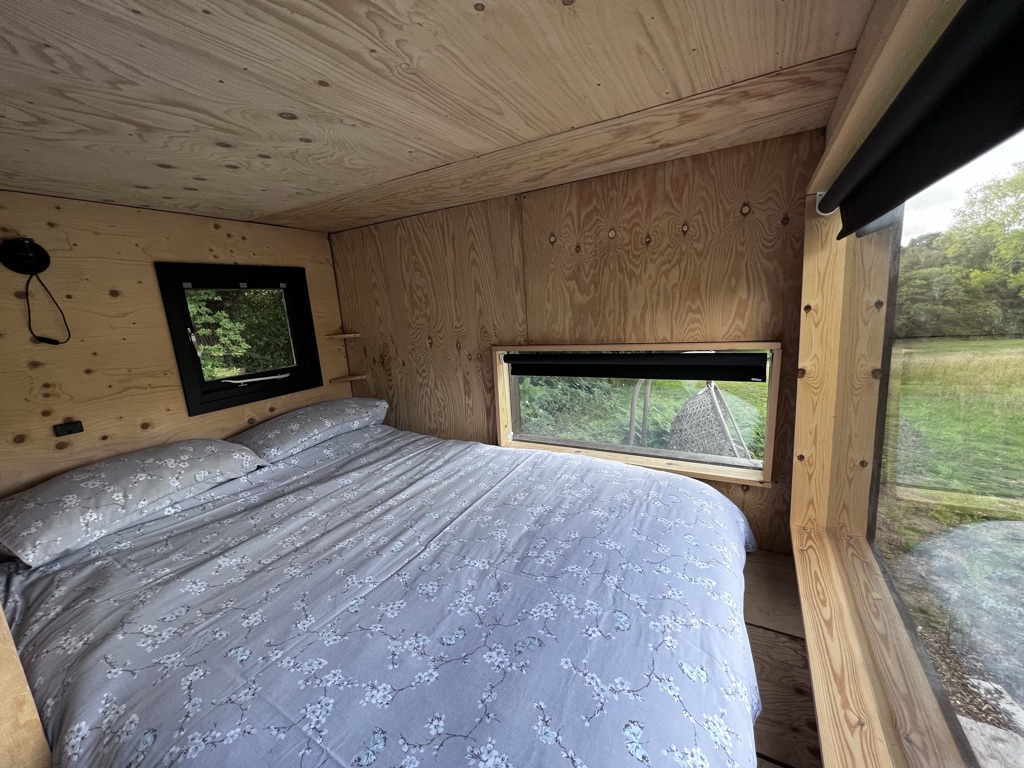 luxury double bed in the Cabin